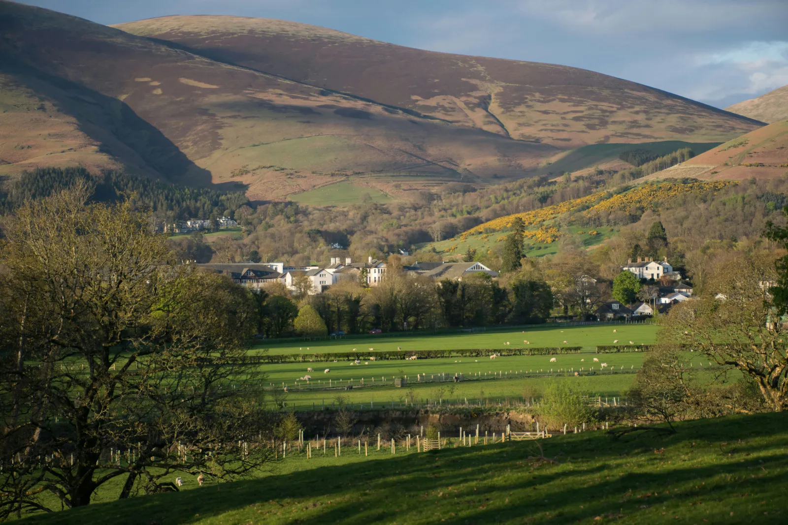 Farm village nestled in a valley — remote rural areas where Integra provides connectivity for smart agriculture